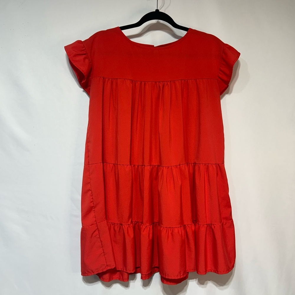 Red tiered dress. Ruffle sleeve.